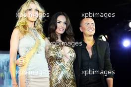 (L to R): Melissa Odabash (USA) Swimwear Designer with Tamara Ecclestone (GBR) and Julien Macdonald (GBR) Fashion Designer at the Amber Lounge Fashion Show.  23.05.2014. Formula 1 World Championship, Rd 6, Monaco Grand Prix, Monte Carlo, Monaco, Friday.