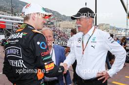 (L to R): Nico Hulkenberg (GER) Sahara Force India F1 with his manager Manfred Zimmerman (GER) CMG and Dr. Dieter Zetsche (GER) Daimler AG CEO. 25.05.2014. Formula 1 World Championship, Rd 6, Monaco Grand Prix, Monte Carlo, Monaco, Race Day.