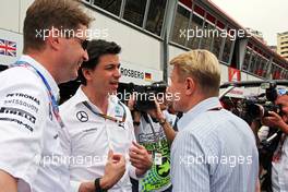 Toto Wolff (GER) Mercedes AMG F1 Shareholder and Executive Director with Mika Hakkinen (FIN). 25.05.2014. Formula 1 World Championship, Rd 6, Monaco Grand Prix, Monte Carlo, Monaco, Race Day.