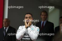 Second placed Lewis Hamilton (GBR) Mercedes AMG F1 on the podium. 25.05.2014. Formula 1 World Championship, Rd 6, Monaco Grand Prix, Monte Carlo, Monaco, Race Day.