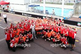 Jules Bianchi (FRA) Marussia F1 Team celebrates his and the team's first F1 points with the team. 25.05.2014. Formula 1 World Championship, Rd 6, Monaco Grand Prix, Monte Carlo, Monaco, Race Day.