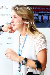 Camille Marchetti (FRA), girlfriend of Jules Bianchi (FRA) Marussia F1 Team, celebrates Jules Bianchi (FRA) scoring his first F1 points. 25.05.2014. Formula 1 World Championship, Rd 6, Monaco Grand Prix, Monte Carlo, Monaco, Race Day.