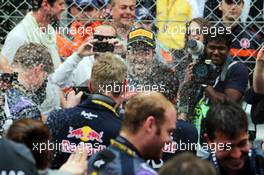 Daniel Ricciardo (AUS) Red Bull Racing celebrates his third position on the podium. 25.05.2014. Formula 1 World Championship, Rd 6, Monaco Grand Prix, Monte Carlo, Monaco, Race Day.