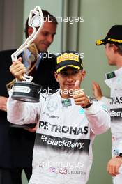 Lewis Hamilton (GBR) Mercedes AMG F1 celebrates his second position on the podium. 25.05.2014. Formula 1 World Championship, Rd 6, Monaco Grand Prix, Monte Carlo, Monaco, Race Day.