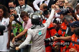 Race winner Nico Rosberg (GER) Mercedes AMG F1 celebrates with the team in parc ferme. 25.05.2014. Formula 1 World Championship, Rd 6, Monaco Grand Prix, Monte Carlo, Monaco, Race Day.
