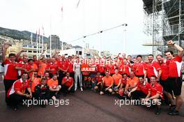 Jules Bianchi (FRA) and the Marussia F1 Team celebrate his and the team's first ever F1 points with his ninth place finish. 25.05.2014. Formula 1 World Championship, Rd 6, Monaco Grand Prix, Monte Carlo, Monaco, Race Day.
