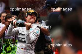 Race winner Lewis Hamilton (GBR) Mercedes AMG F1 celebrates with the champagne at the podium. 25.05.2014. Formula 1 World Championship, Rd 6, Monaco Grand Prix, Monte Carlo, Monaco, Race Day.