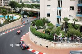 Jules Bianchi (FRA) Marussia F1 Team MR03 leads Jean-Eric Vergne (FRA) Scuderia Toro Rosso STR9. 25.05.2014. Formula 1 World Championship, Rd 6, Monaco Grand Prix, Monte Carlo, Monaco, Race Day.