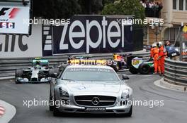 Nico Rosberg (GER) Mercedes AMG F1 W05 leads behind the FIA Safety Car. 25.05.2014. Formula 1 World Championship, Rd 6, Monaco Grand Prix, Monte Carlo, Monaco, Race Day.