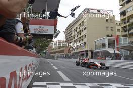 Max Chilton (GBR) Marussia F1 Team MR03 takes the chequered flag at the end of the race. 25.05.2014. Formula 1 World Championship, Rd 6, Monaco Grand Prix, Monte Carlo, Monaco, Race Day.