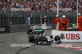 Lewis Hamilton (GBR) Mercedes AMG F1 W05 leads Daniel Ricciardo (AUS) Red Bull Racing RB10. 25.05.2014. Formula 1 World Championship, Rd 6, Monaco Grand Prix, Monte Carlo, Monaco, Race Day.