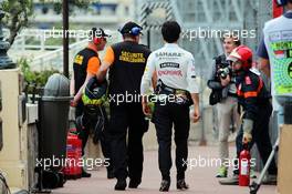 Sergio Perez (MEX) Sahara Force India F1 walks back to the pits after he retired from the race. 25.05.2014. Formula 1 World Championship, Rd 6, Monaco Grand Prix, Monte Carlo, Monaco, Race Day.