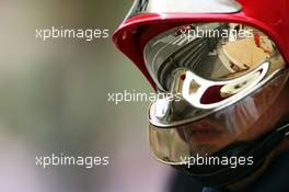 Kimi Raikkonen (FIN) Ferrari F14-T reflected through a fireman's helmet visor. 25.05.2014. Formula 1 World Championship, Rd 6, Monaco Grand Prix, Monte Carlo, Monaco, Race Day.