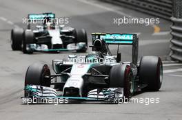 Nico Rosberg (GER) Mercedes AMG F1 W05 leads team mate Lewis Hamilton (GBR) Mercedes AMG F1 W05. 25.05.2014. Formula 1 World Championship, Rd 6, Monaco Grand Prix, Monte Carlo, Monaco, Race Day.