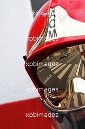 Kamui Kobayashi (JPN) Caterham CT05 reflected in a fireman's helmet visor. 25.05.2014. Formula 1 World Championship, Rd 6, Monaco Grand Prix, Monte Carlo, Monaco, Race Day.