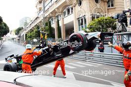 The Sahara Force India F1 VJM07 of Sergio Perez (MEX) Sahara Force India F1 is craned away after he crashed out of the race. 25.05.2014. Formula 1 World Championship, Rd 6, Monaco Grand Prix, Monte Carlo, Monaco, Race Day.