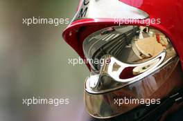 Jules Bianchi (FRA) Marussia F1 Team MR03 reflected through a fireman's helmet visor. 25.05.2014. Formula 1 World Championship, Rd 6, Monaco Grand Prix, Monte Carlo, Monaco, Race Day.