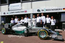 Lewis Hamilton (GBR) Mercedes AMG F1 and team mate Nico Rosberg (GER) Mercedes AMG F1 with Dr. Dieter Zetsche (GER) Daimler AG CEO and Toto Wolff (GER) Mercedes AMG F1 Shareholder and Executive Director as Petronas extend their title sponsorship with the Mercedes AMG F1 Team. 24.05.2014. Formula 1 World Championship, Rd 6, Monaco Grand Prix, Monte Carlo, Monaco, Qualifying Day