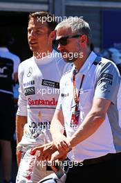 Jenson Button (GBR) McLaren with Adam Cooper (GBR) McLaren Press Officer. 24.05.2014. Formula 1 World Championship, Rd 6, Monaco Grand Prix, Monte Carlo, Monaco, Qualifying Day