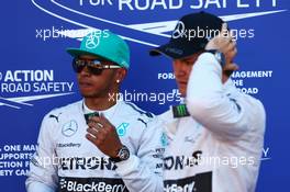 (L to R): Second placed Lewis Hamilton (GBR) Mercedes AMG F1 in parc ferme with team mate Nico Rosberg (GER) Mercedes AMG F1, who took pole position. 24.05.2014. Formula 1 World Championship, Rd 6, Monaco Grand Prix, Monte Carlo, Monaco, Qualifying Day