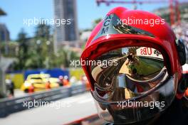 Sergio Perez (MEX) Sahara Force India F1 VJM07 reflected in a fireman's helmet visor. 24.05.2014. Formula 1 World Championship, Rd 6, Monaco Grand Prix, Monte Carlo, Monaco, Qualifying Day