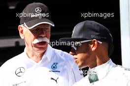 (L to R): Dr. Dieter Zetsche (GER) Daimler AG CEO with Lewis Hamilton (GBR) Mercedes AMG F1. 24.05.2014. Formula 1 World Championship, Rd 6, Monaco Grand Prix, Monte Carlo, Monaco, Qualifying Day