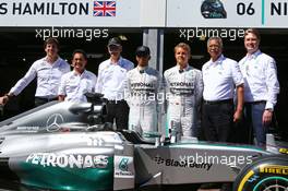 Lewis Hamilton (GBR) Mercedes AMG F1 and team mate Nico Rosberg (GER) Mercedes AMG F1 with Dr. Dieter Zetsche (GER) Daimler AG CEO and Toto Wolff (GER) Mercedes AMG F1 Shareholder and Executive Director as Petronas extend their title sponsorship with the Mercedes AMG F1 Team. 24.05.2014. Formula 1 World Championship, Rd 6, Monaco Grand Prix, Monte Carlo, Monaco, Qualifying Day