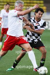 Sergio Perez (MEX) Sahara Force India F1 and Didier Deschamps (FRA) Former Football Player at the charity football match. 20.05.2014. Formula 1 World Championship, Rd 6, Monaco Grand Prix, Monte Carlo, Monaco, Tuesday Soccer.