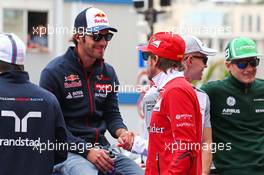 (L to R): Jean-Eric Vergne (FRA) Scuderia Toro Rosso and Fernando Alonso (ESP) Ferrari on the drivers parade. 25.05.2014. Formula 1 World Championship, Rd 6, Monaco Grand Prix, Monte Carlo, Monaco, Race Day.
