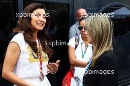 (L to R): Fabiana Flosi (BRA), wife of Bernie Ecclestone (GBR), with Rafaela Bassi (BRA), wife of Felipe Massa (BRA) Williams. 25.05.2014. Formula 1 World Championship, Rd 6, Monaco Grand Prix, Monte Carlo, Monaco, Race Day.