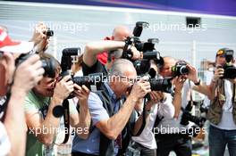 Photographers in the paddock. 25.05.2014. Formula 1 World Championship, Rd 6, Monaco Grand Prix, Monte Carlo, Monaco, Race Day.