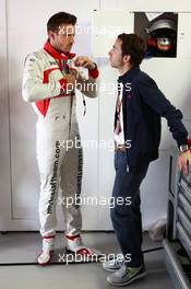 Jules Bianchi (FRA) Marussia F1 Team with Nicolas Todt (FRA) Driver Manager. 22.05.2014. Formula 1 World Championship, Rd 6, Monaco Grand Prix, Monte Carlo, Monaco, Practice Day.