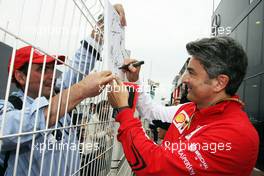 Marco Mattiacci (ITA) Ferrari Team Principal signs autographs for the fans. 22.05.2014. Formula 1 World Championship, Rd 6, Monaco Grand Prix, Monte Carlo, Monaco, Practice Day.