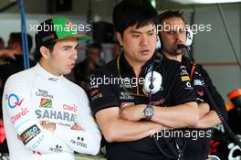 (L to R): Sergio Perez (MEX) Sahara Force India F1 with Jun Matsuzaki (JPN) Sahara Force India F1 Team Senior Tyre Engineer. 22.05.2014. Formula 1 World Championship, Rd 6, Monaco Grand Prix, Monte Carlo, Monaco, Practice Day.