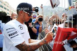 Lewis Hamilton (GBR) Mercedes AMG F1 signs autographs for the fans. 21.05.2014. Formula 1 World Championship, Rd 6, Monaco Grand Prix, Monte Carlo, Monaco, Preparation Day.