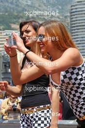 Promotional girls in the pits. 21.05.2014. Formula 1 World Championship, Rd 6, Monaco Grand Prix, Monte Carlo, Monaco, Preparation Day.