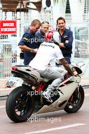 Lewis Hamilton (GBR) Mercedes AMG F1 on his motorbike in the pits. 21.05.2014. Formula 1 World Championship, Rd 6, Monaco Grand Prix, Monte Carlo, Monaco, Preparation Day.