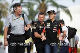 (L to R): Mario Isola (ITA) Pirelli Racing Manager with Pastor Maldonado (VEN) Lotus F1 Team. 28.03.2014. Formula 1 World Championship, Rd 2, Malaysian Grand Prix, Sepang, Malaysia, Friday.