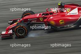 Kimi Raikkonen (FIN) Ferrari F14-T locks up under braking. 28.03.2014. Formula 1 World Championship, Rd 2, Malaysian Grand Prix, Sepang, Malaysia, Friday.