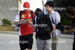 Kimi Raikkonen (FIN) Ferrari signs autographs for the fans. 28.03.2014. Formula 1 World Championship, Rd 2, Malaysian Grand Prix, Sepang, Malaysia, Friday.