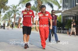 (L to R): Fernando Alonso (ESP) Ferrari with Fabrizio Borra (ESP) Physio. 28.03.2014. Formula 1 World Championship, Rd 2, Malaysian Grand Prix, Sepang, Malaysia, Friday.