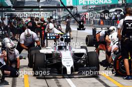 Valtteri Bottas (FIN) Williams FW36 practices a pit stop. 28.03.2014. Formula 1 World Championship, Rd 2, Malaysian Grand Prix, Sepang, Malaysia, Friday.