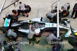 Nico Rosberg (GER) Mercedes AMG F1 W05 practices a pit stop. 28.03.2014. Formula 1 World Championship, Rd 2, Malaysian Grand Prix, Sepang, Malaysia, Friday.