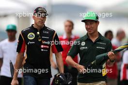 Pastor Maldonado (VEN), Lotus F1 Team and Kamui Kobayashi (JPN), Caterham F1 Team  28.03.2014. Formula 1 World Championship, Rd 2, Malaysian Grand Prix, Sepang, Malaysia, Friday.