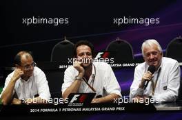 (L to R): Fabrice Lom (FRA) FIA Head of Power Train gives a briefing to the media on fuel sensors with Matteo Bonciani (ITA) FIA Media Delegate and Charlie Whiting (GBR) FIA Delegate. 28.03.2014. Formula 1 World Championship, Rd 2, Malaysian Grand Prix, Sepang, Malaysia, Friday.