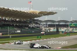 Felipe Massa (BRA) Williams FW36 leads team mate Valtteri Bottas (FIN) Williams FW36. 30.03.2014. Formula 1 World Championship, Rd 2, Malaysian Grand Prix, Sepang, Malaysia, Sunday.