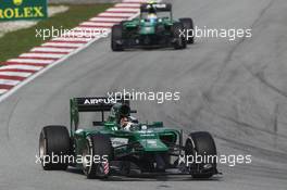 Kamui Kobayashi (JPN) Caterham CT05 leads team mate Marcus Ericsson (SWE) Caterham CT05. 30.03.2014. Formula 1 World Championship, Rd 2, Malaysian Grand Prix, Sepang, Malaysia, Sunday.