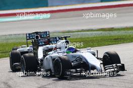 Felipe Massa (BRA) Williams FW36 leads team mate Valtteri Bottas (FIN) Williams FW36. 30.03.2014. Formula 1 World Championship, Rd 2, Malaysian Grand Prix, Sepang, Malaysia, Sunday.