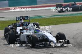 Felipe Massa (BRA) Williams FW36 leads Valtteri Bottas (FIN) Williams FW36. 30.03.2014. Formula 1 World Championship, Rd 2, Malaysian Grand Prix, Sepang, Malaysia, Sunday.