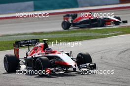 Max Chilton (GBR) Marussia F1 Team MR03 leads Jules Bianchi (FRA) Marussia F1 Team MR03. 30.03.2014. Formula 1 World Championship, Rd 2, Malaysian Grand Prix, Sepang, Malaysia, Sunday.